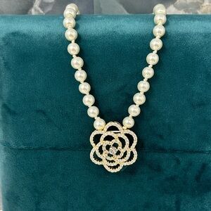 Elegant Pearl Necklace with Gold Floral Pendant